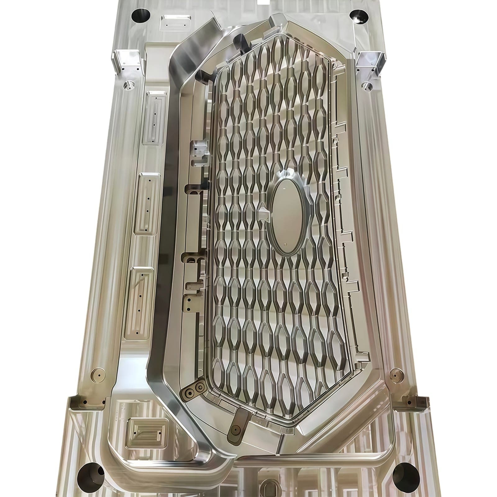 Customer sample: textured grille mold cavity with emblem cutout, machined to the customer's drawing.